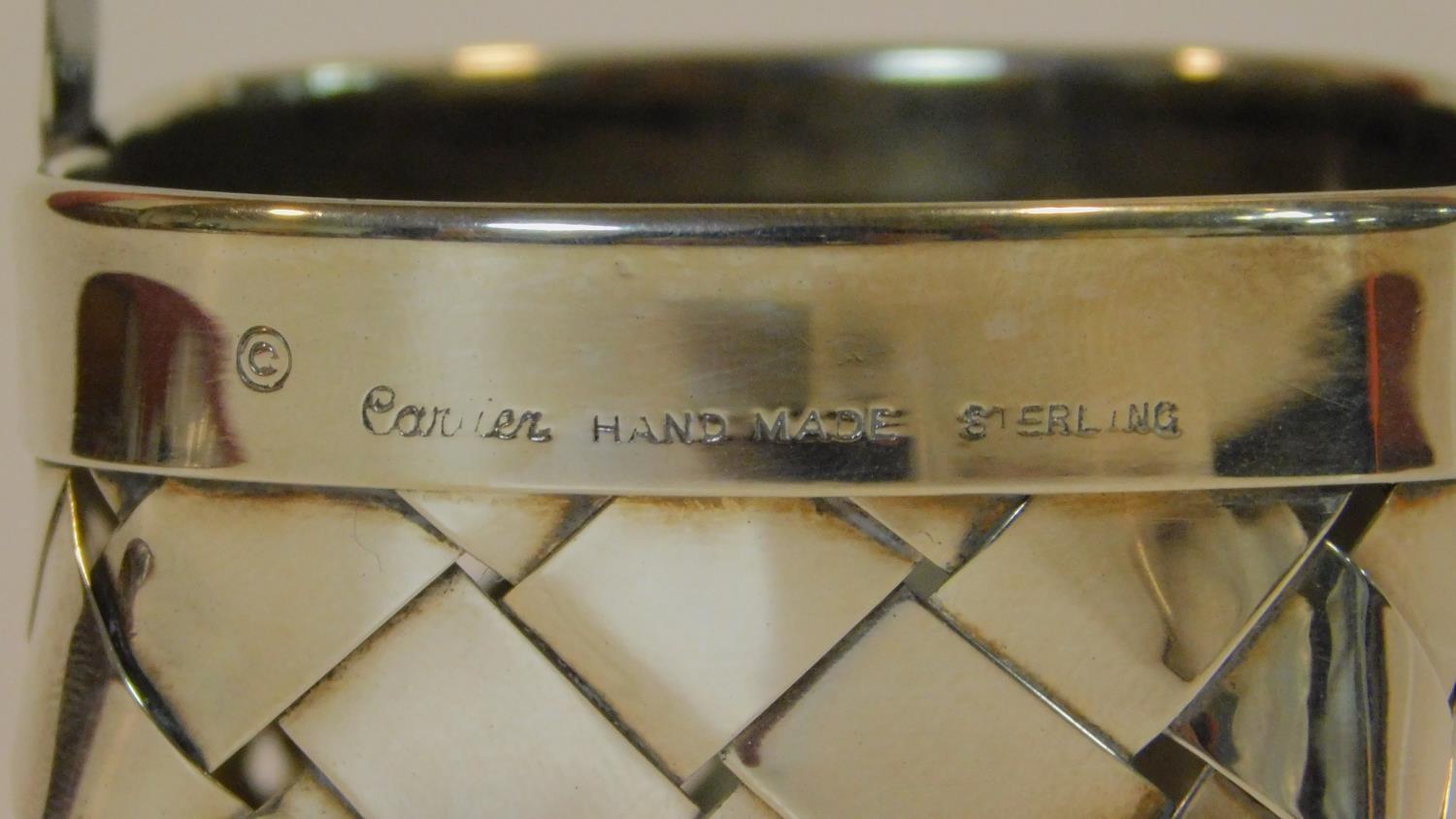 A Cartier silver basket of oval woven form with a scalloped edged handle, end marked to the side - Image 4 of 6