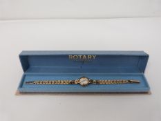 A vintage 9ct gold ladies Rotary 21 Jewels cocktail watch in original Rotary box. The watch has a