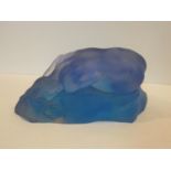 An Art Deco blue art glass sculpture of a naked female hunched over head on the floor. L.30