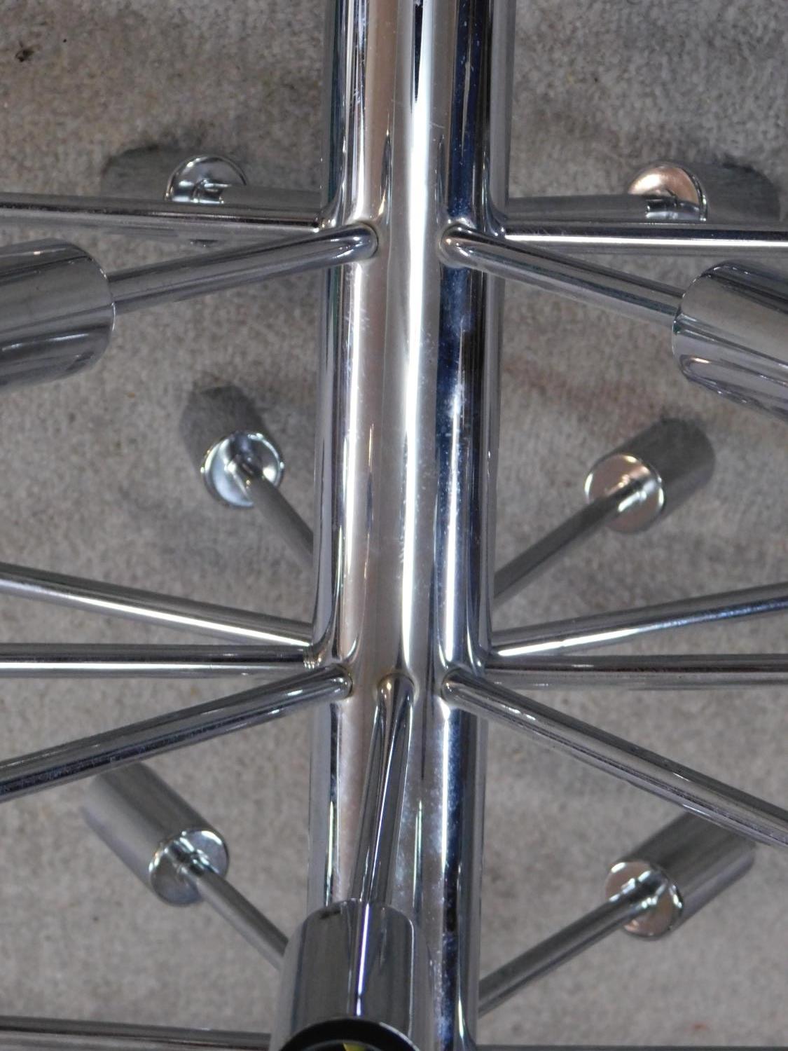 A chromium sputnik style ceiling chandelier with 24 arms on a central column. 60x55cm - Image 3 of 5