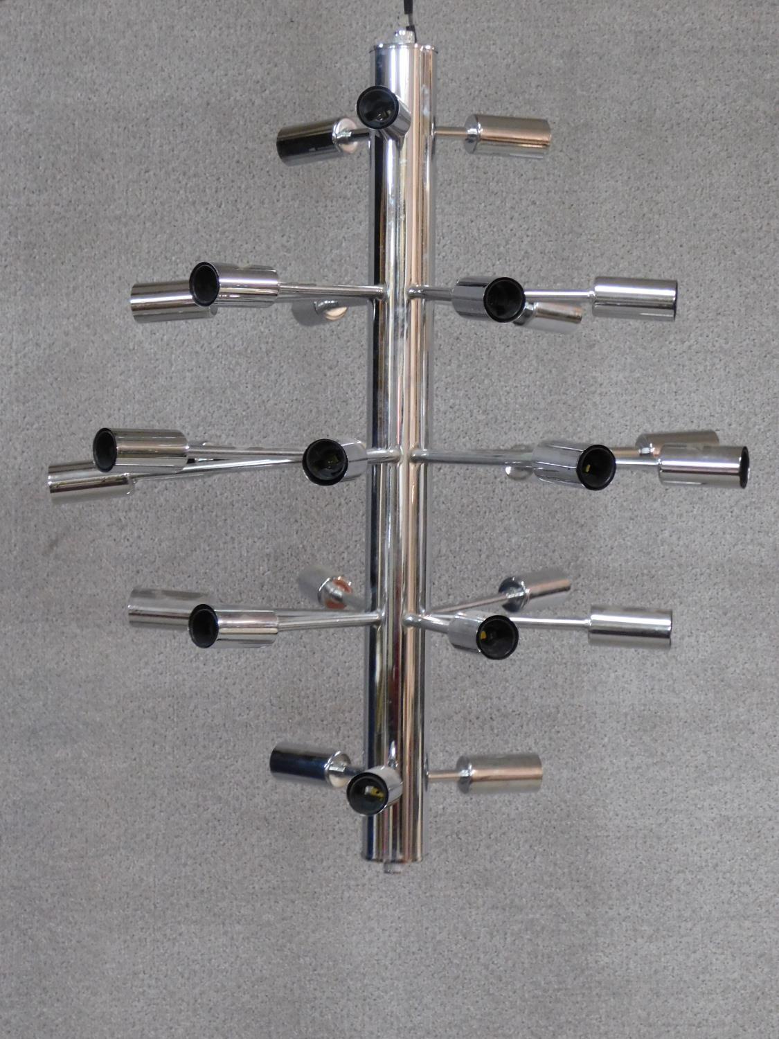 A chromium sputnik style ceiling chandelier with 24 arms on a central column. 60x55cm - Image 2 of 5