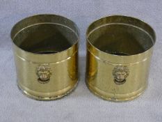 A pair of circular vintage brass coal buckets with lion head handles. H.28xD.30cm