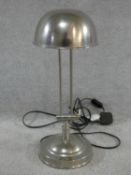 A vintage brushed metal adjustable desk lamp. H.47cm
