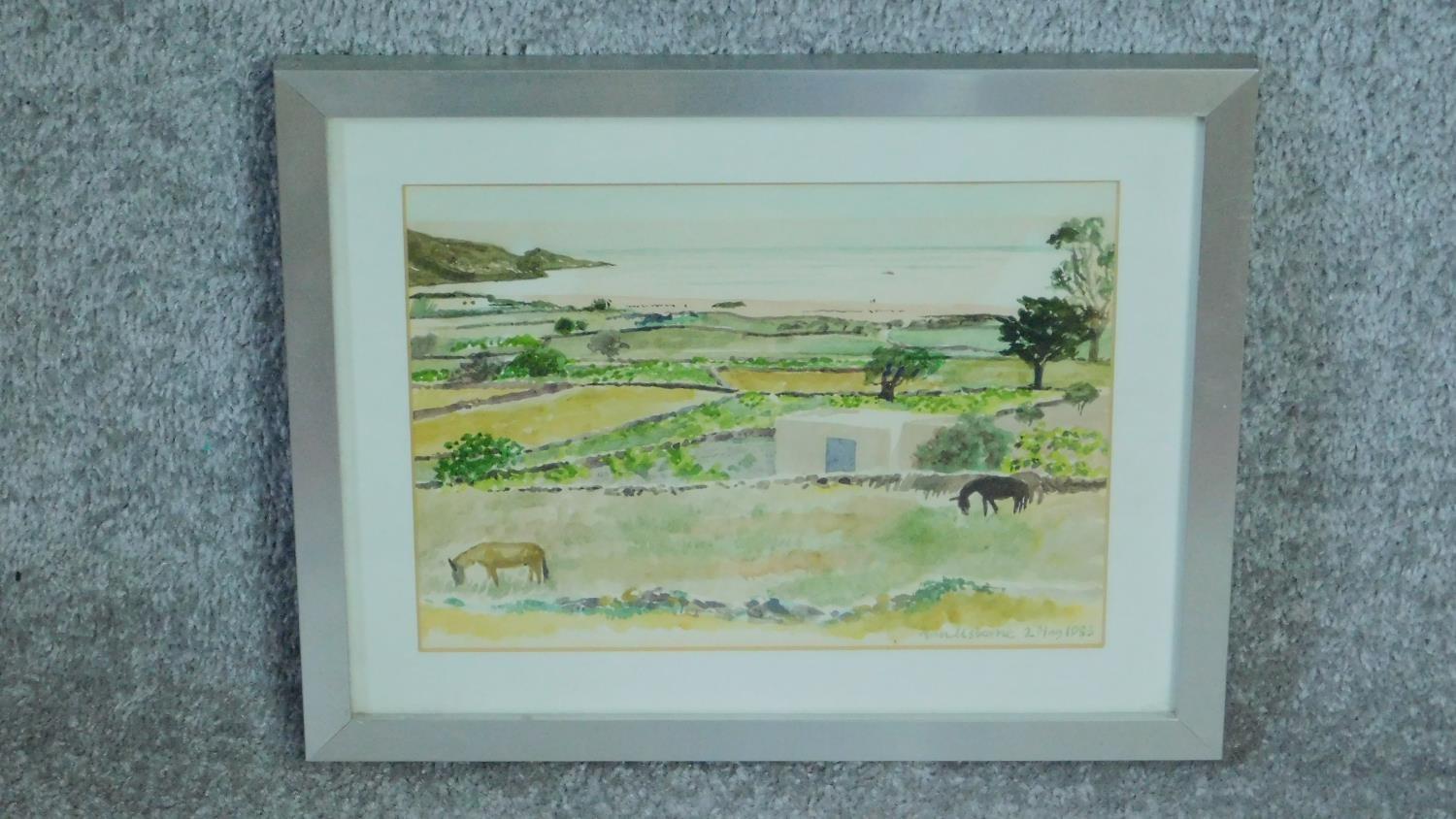 A framed and glazed watercolour of Santorini landscape by a British painter Anne Usborne. Signed and