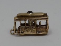A yellow metal (tested 9ct yellow gold) San Francisco Stanhope charm with various tourist attraction