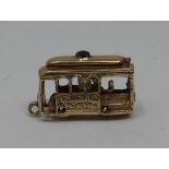 A yellow metal (tested 9ct yellow gold) San Francisco Stanhope charm with various tourist attraction