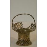 A Victorian silver pierced posy basket with twisted handle. Birmingham 1907. H.12cm