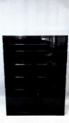 A 1980's vintage Cappellini chest of five drawers above cabniet doors in high gloss black