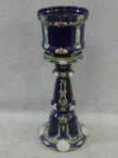 A 19th century blue glazed jardiniere on stand in the Art Nouveau style. H.89cm (damage to base)