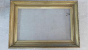 A large 19th century giltwood and gesso gallery sized picture frame. 110x160cm