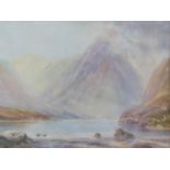 A 19th century gilt framed and glazed watercolour, loch with mountains in the distance, unsigned.