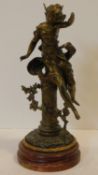 A 19th century French spelter figure, young girl in flowing robes with plaque marked Papillon on a