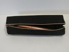 A GHD hair straightener, rose gold edition with case. L.32cm