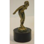 A 1920/1930's brass car mascot in the form of a female bather about to dive mounted on an ebonised