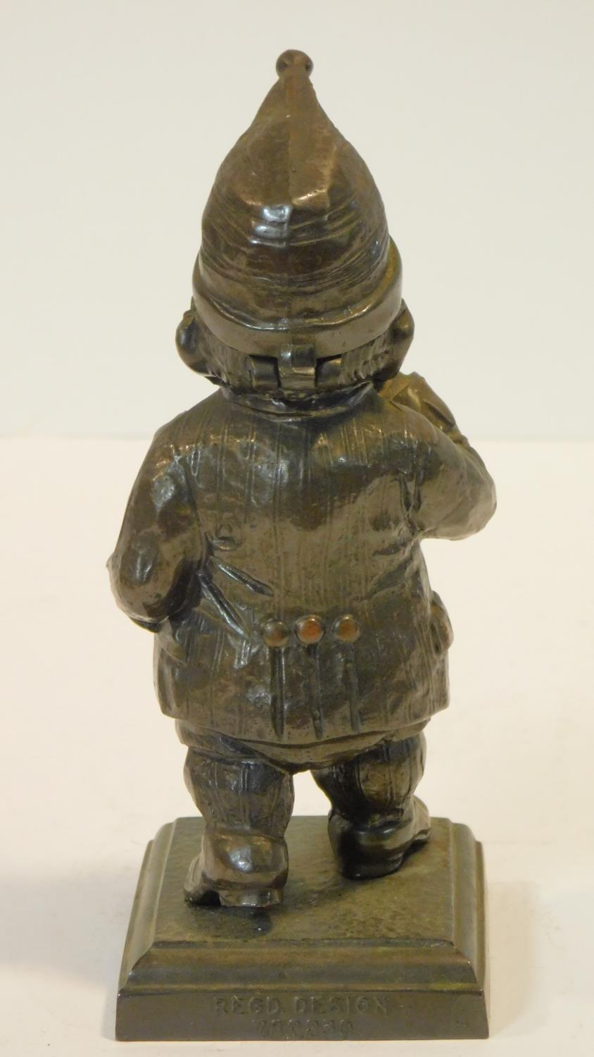 A vintage copper table lighter in the form of Mr Punch, hat is hinged and opens to show lighter. - Image 3 of 5