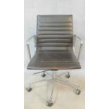 A vintage Charles and Ray Eames inspired Aluminium Group style office desk armchair in black