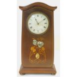 A late 19th century mahogany cased mantel clock with white enamel dial and Roman numerals and