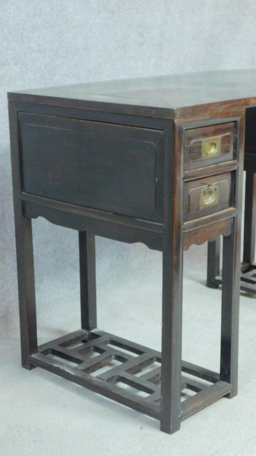 A 19th century Chinese teak three section pedestal desk fitted with two drawers to each side above - Image 4 of 7