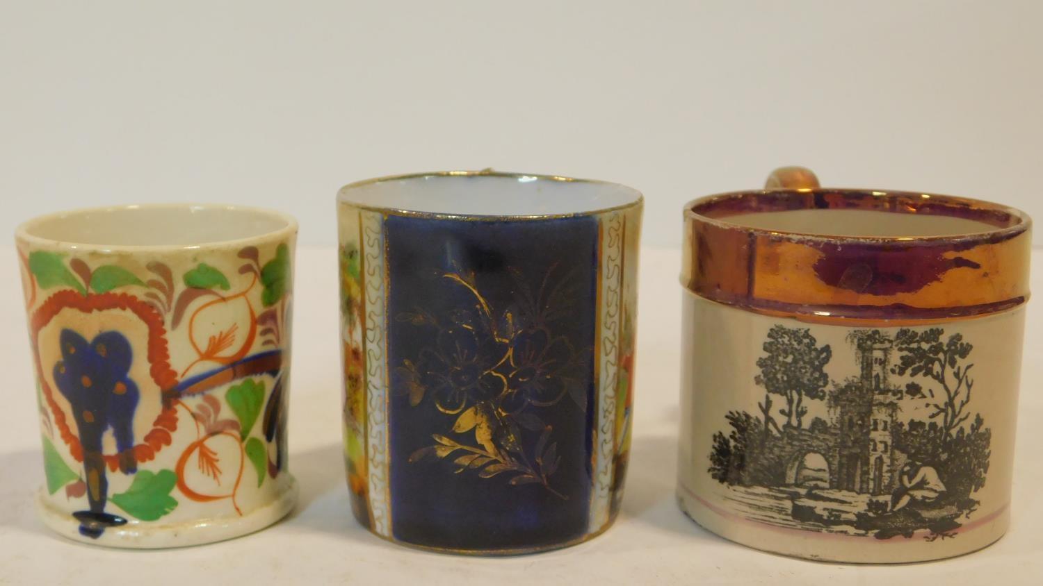 A collection of eleven porcelain hand painted antique coffee cups, all with various designs and some - Image 4 of 6