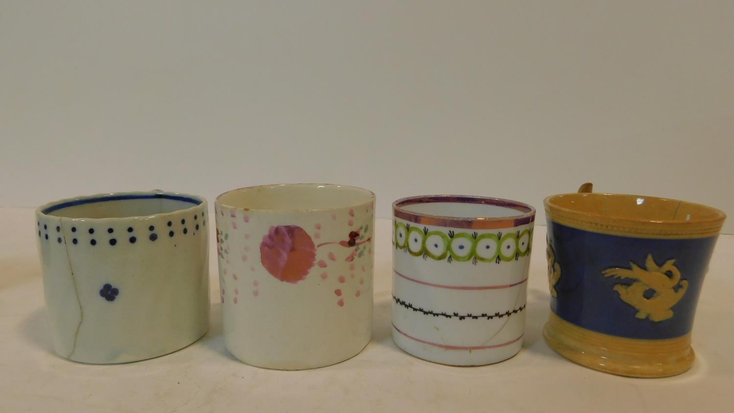 A collection of eleven porcelain hand painted antique coffee cups, all with various designs and some - Image 3 of 6