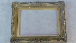 A 19th century gesso Rococo style picture frame. 93x123cm