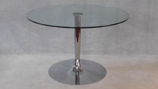 A Calligaris tulip table with plate glass top on aluminium base. H.80 W.120 D.120cm