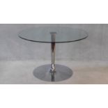 A Calligaris tulip table with plate glass top on aluminium base. H.80 W.120 D.120cm