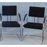 A pair of contemporary Martin Stoll boardroom armchairs on chrome cantilever supports. H.92cm