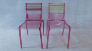 A pair of contemporary moulded string backed side chairs marked Misa Joy for Philippe Starck. H.81cm