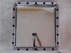 A chrome framed dressing room style mirror to take twenty light bulbs. 70x67cm