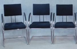 A set of three contemporary Martin Stoll boardroom armchairs on chrome cantilever supports. H.92cm