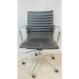 A vintage Charles and Ray Eames inspired Aluminium Group style office desk armchair in black