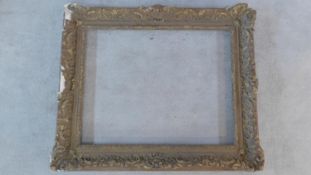 A gesso Rococo style picture frame. 103x125cm