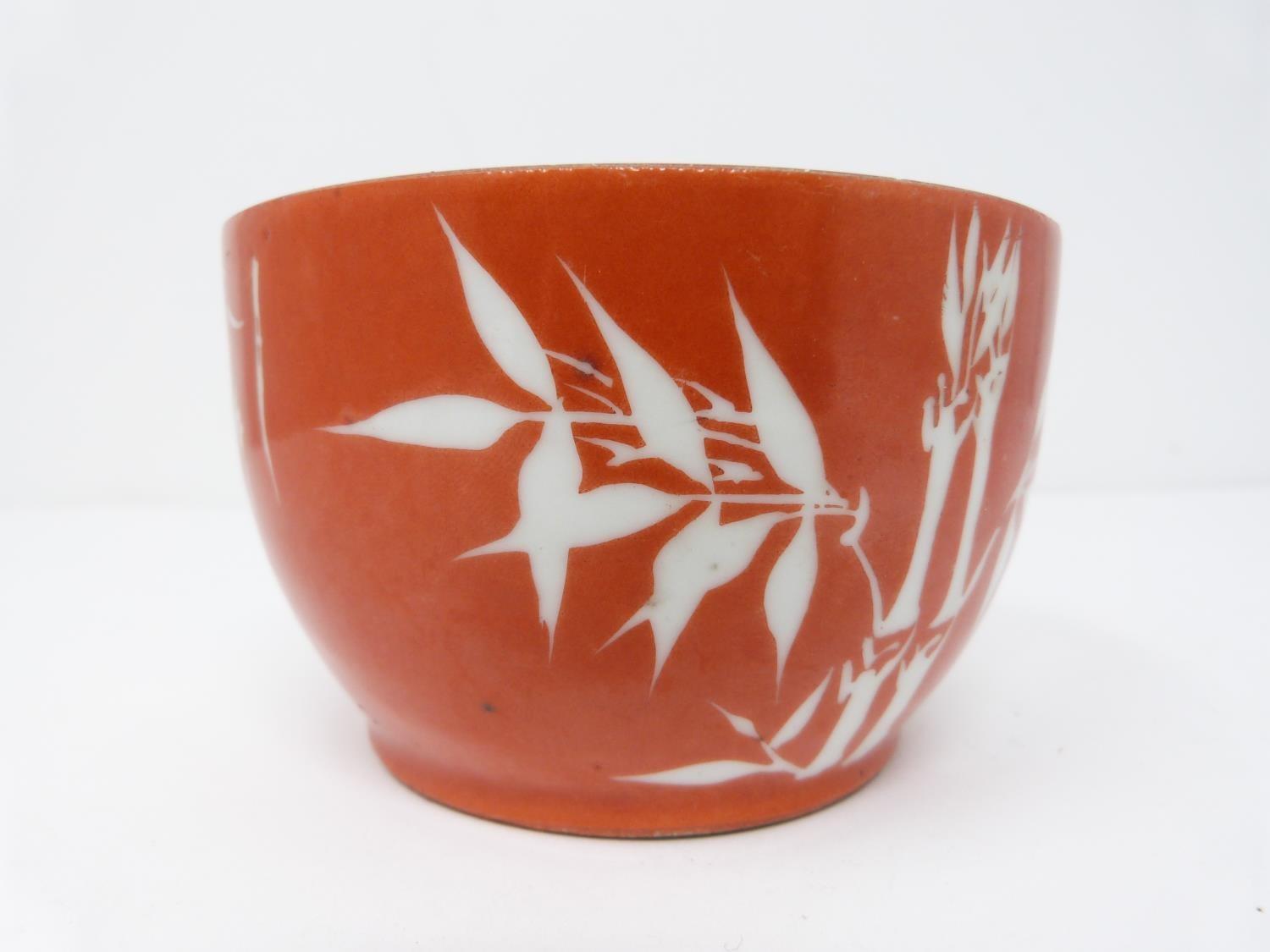 A small Chinese rice bowl with bamboo and calligraphy decoration on a deep red ground, character - Image 2 of 8