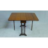 A late 19th century walnut Sutherland table with twin drop flaps on turned tapering supports. H.85