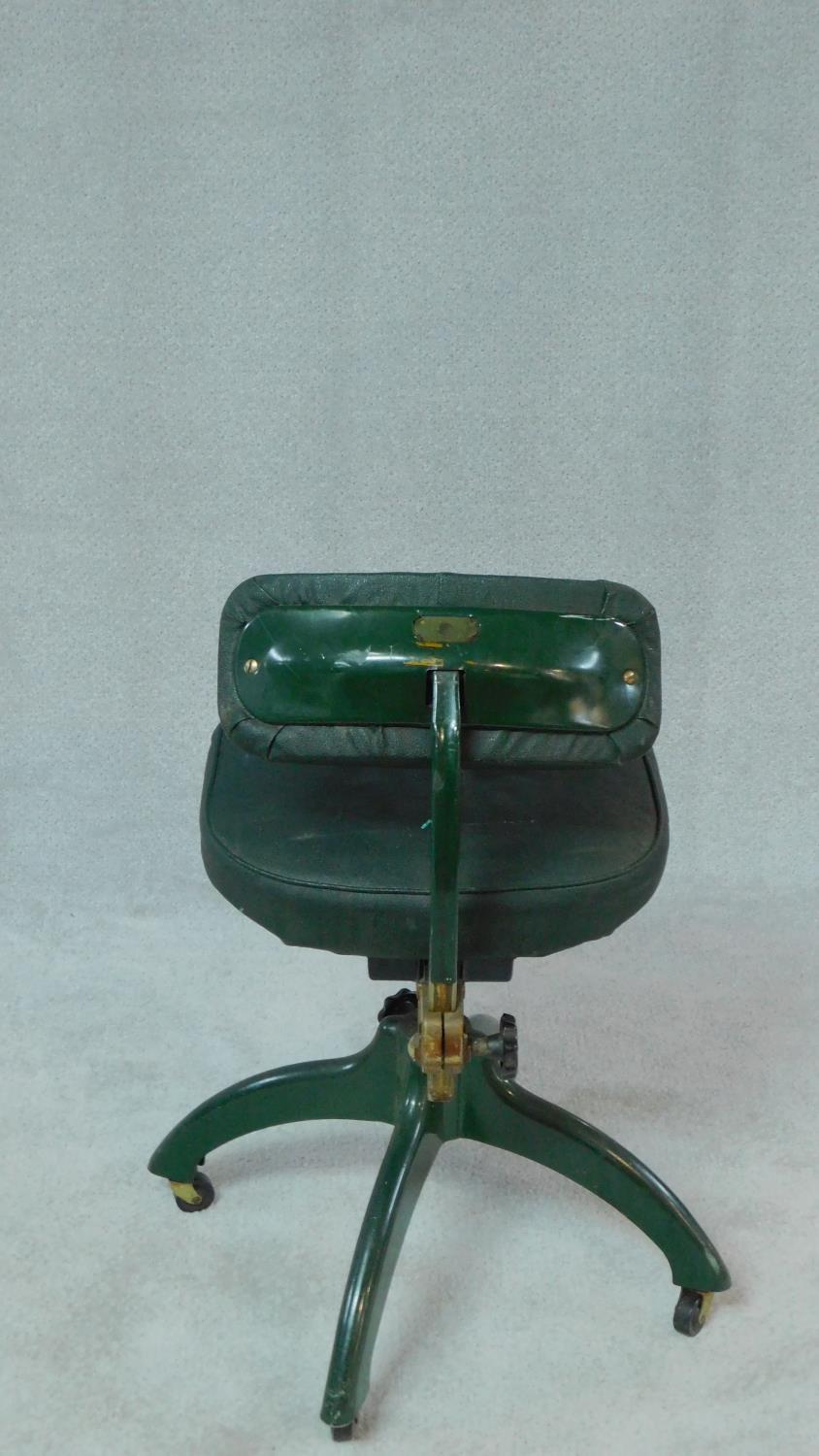 A vintage revolving office desk chair on cast iron base with casters. H.83cm - Image 2 of 3