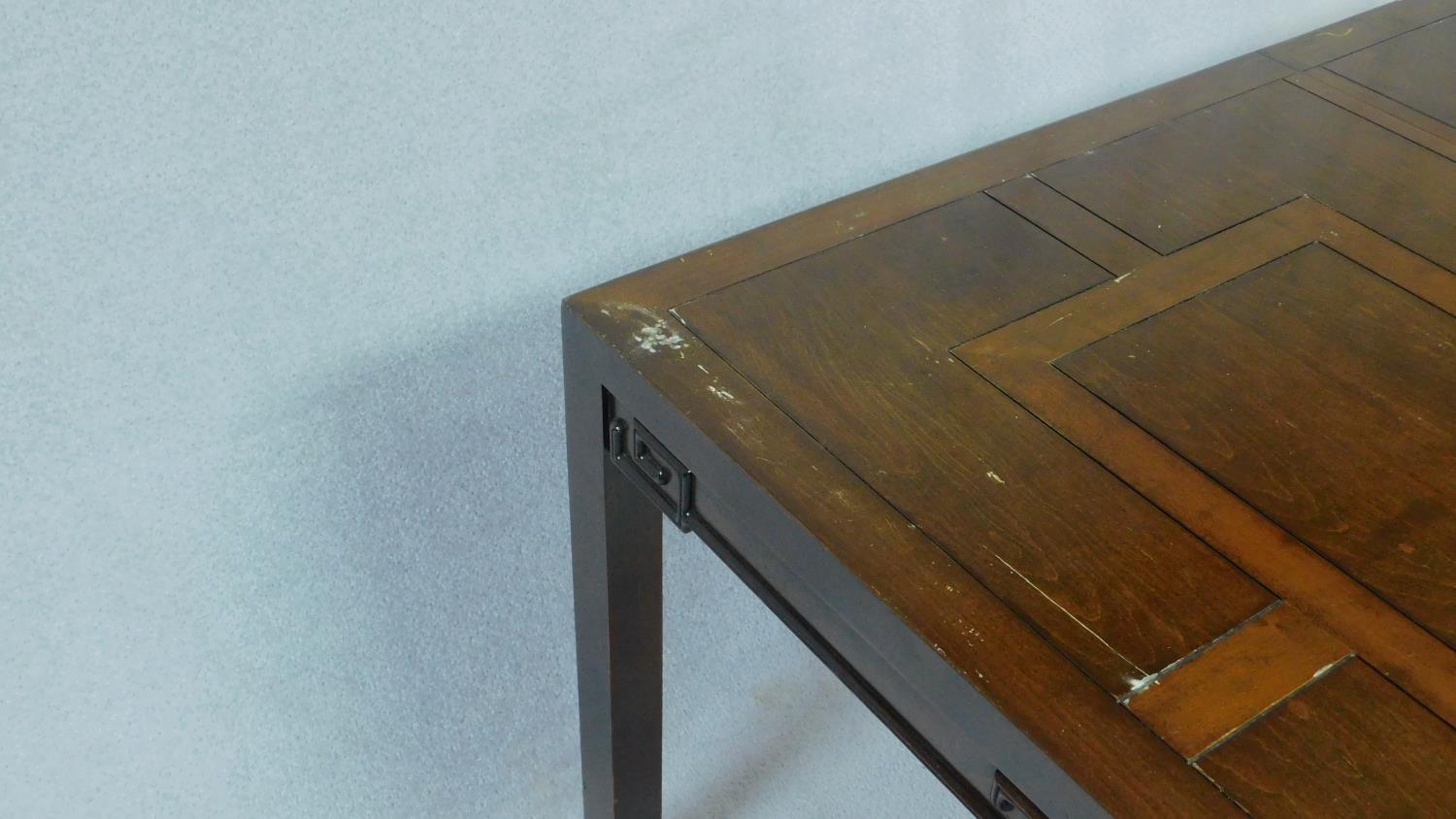 A Chinese hardwood extending dining table with parquetry top above carved frieze on square - Image 4 of 6