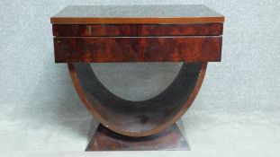 A vintage side table from the giorgio collection in high gloss flame mahogany.