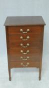 An Edwardian mahogany music chest with six drop front sheet music drawers. H.88 W.50 D.38cm