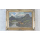 A 19th century gilt framed oil on canvas, Highland cattle in a lakescape, signed H Chester. 70x96cm