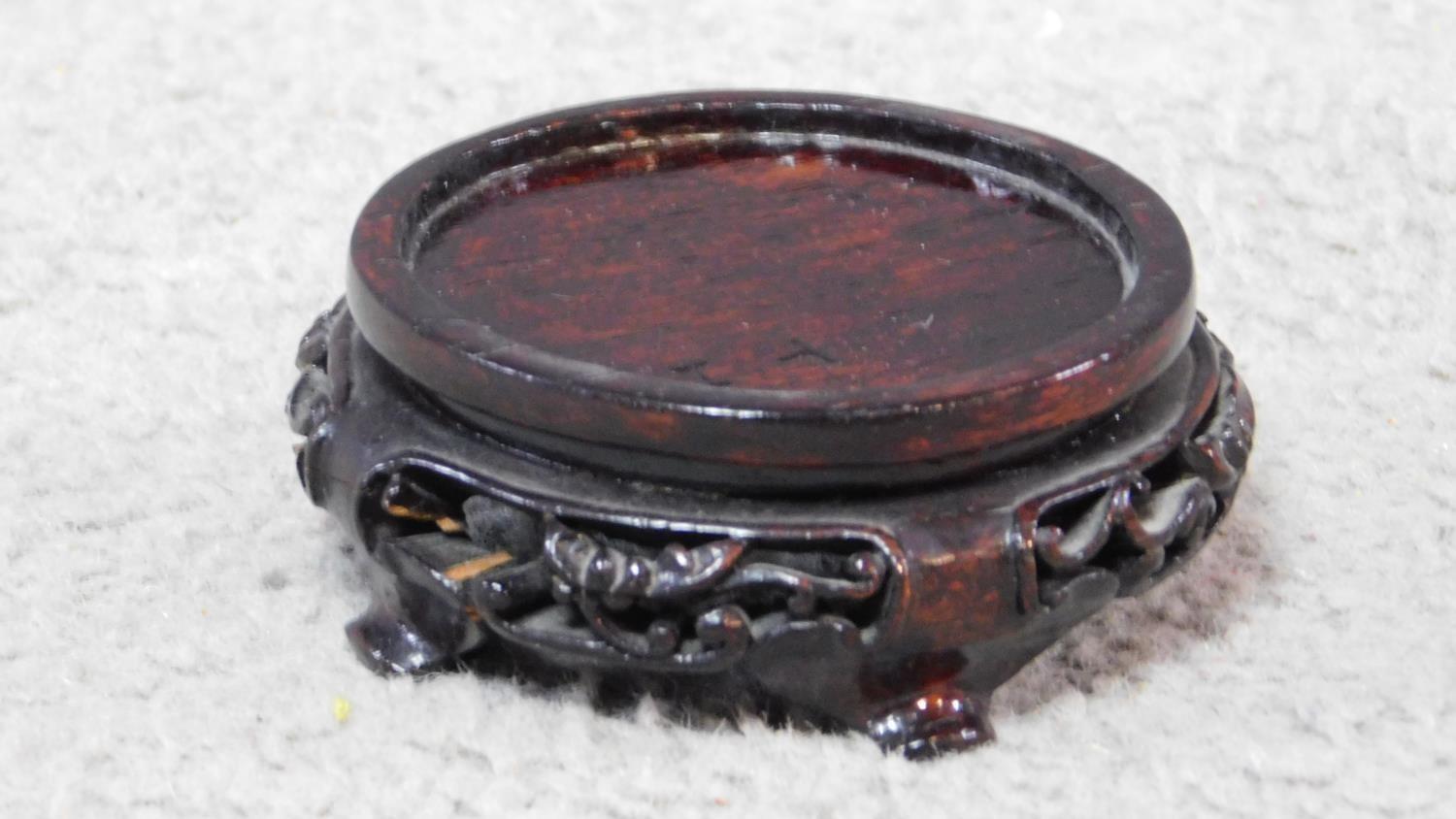 A 20th century serpentine jade lidded censer on a footed pierced carved hardwood base. The censer is - Image 7 of 8