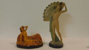 Two Art Deco ceramic painted nude flapper girls. One with a fan and the other lying on a bed with