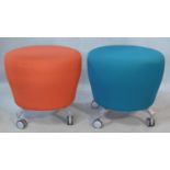 A pair of vintage Orangebox stools in apricot and azure upholstery on metal supports. H.50cm