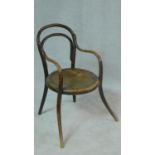 A late 19th century child's bentwood armchair, Vienna makers stamp to the underside. H.80cm