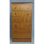 A mid century vintage teak tallboy chest of six drawers. H.126 W.67 D.42cm