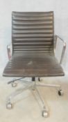 A vintage Charles and Ray Eames inspired Aluminium Group style office desk armchair in black
