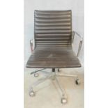 A vintage Charles and Ray Eames inspired Aluminium Group style office desk armchair in black