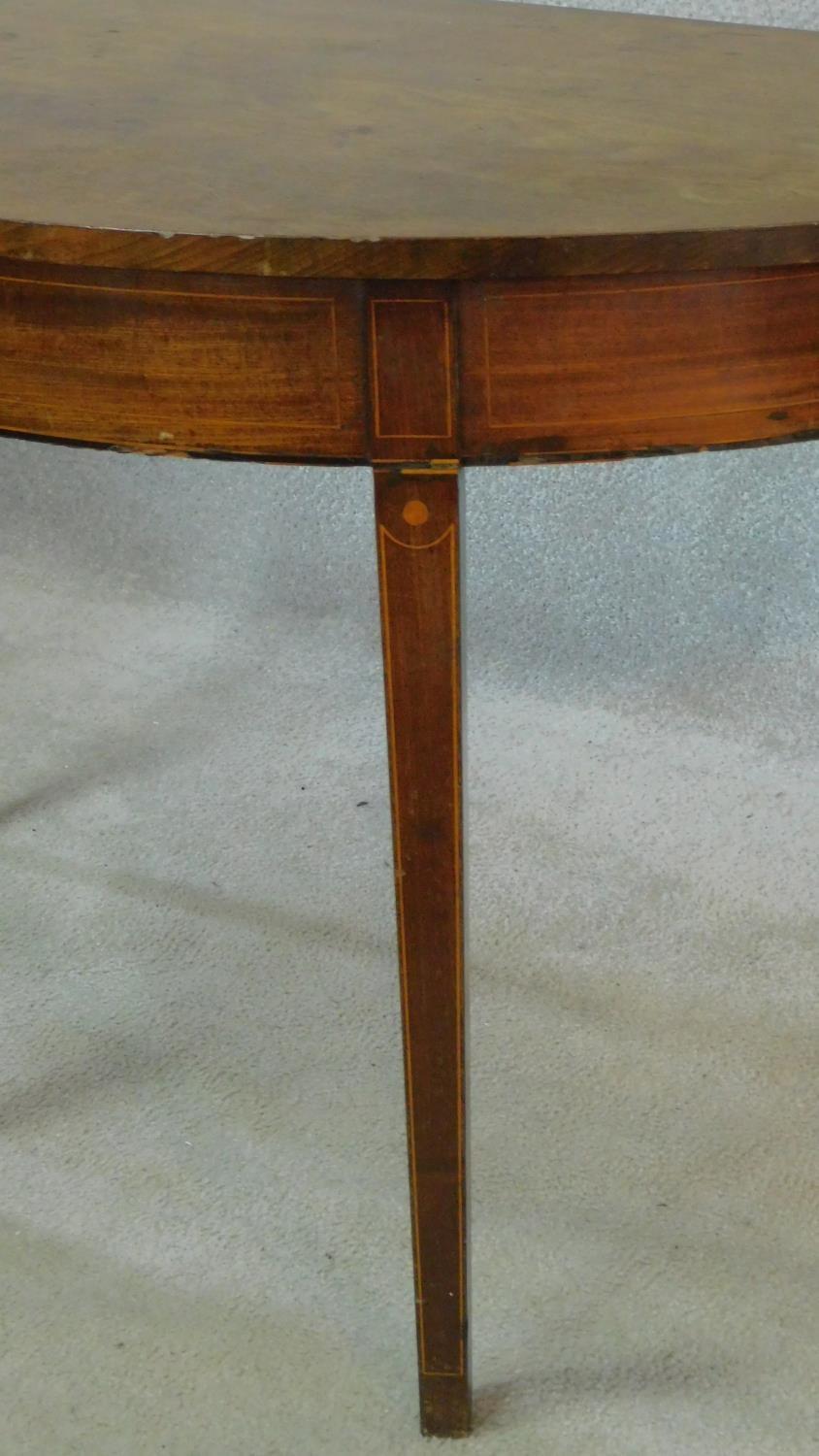 A Georgian mahogany and satinwood inlaid demi lune console table on square tapering legs. H.73 W.122 - Image 3 of 3