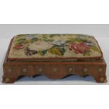 A 19th century walnut framed footstool with its original beaded floral tapestry drop in pad. H.10