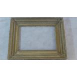 A 19th century gilt and gesso picture frame. 118x92cm
